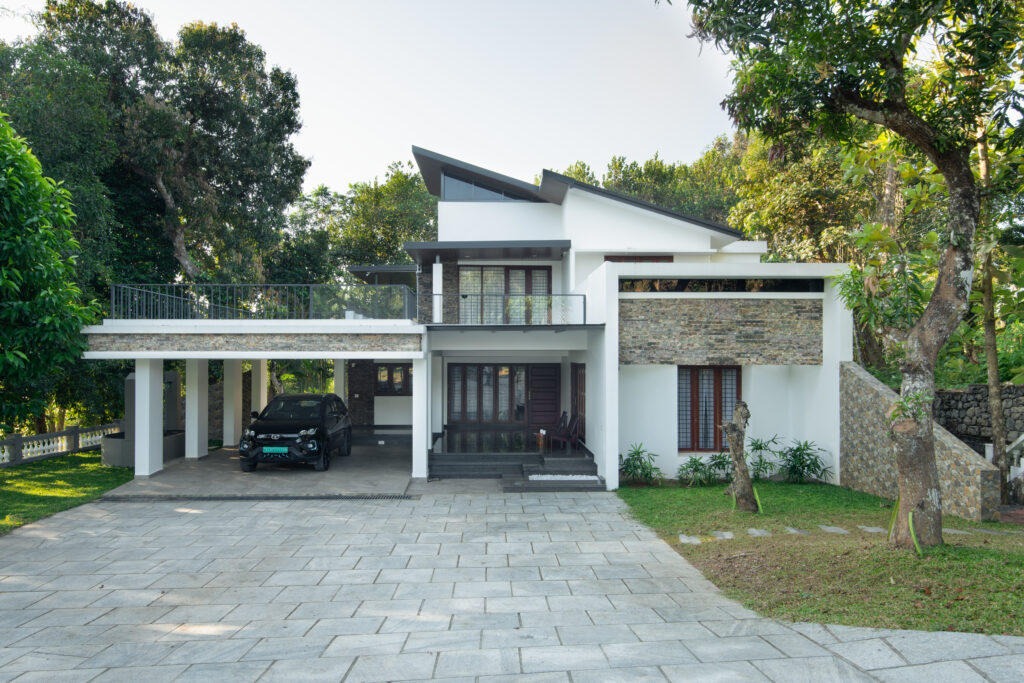 Hide away House - Image of a well thought two storied contemporary house.
